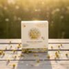 Glowtic Chamomile Soap lifestyle image with chamomile flowers for soothing and calming skincare.